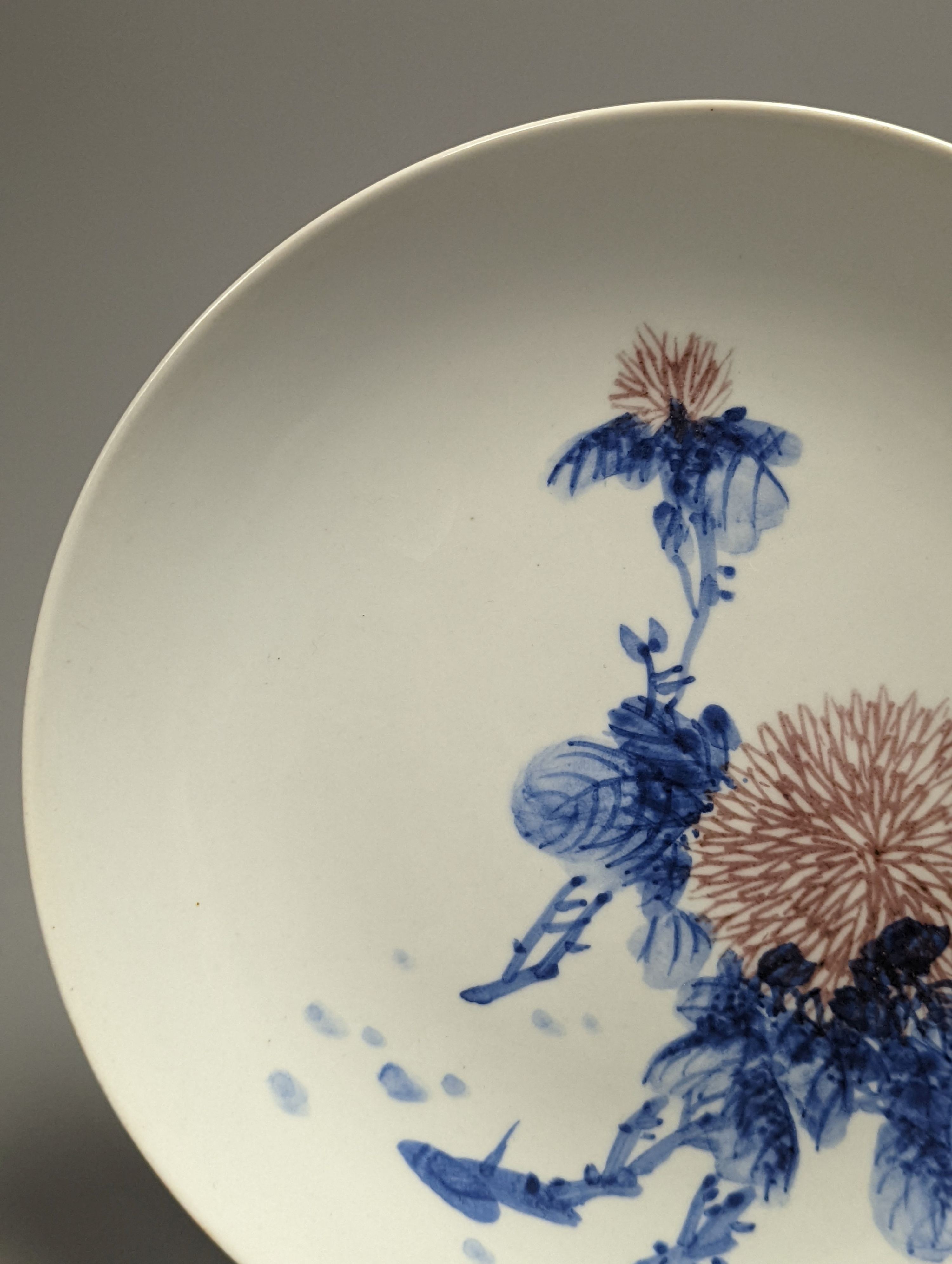 A Chinese floral saucer dish, diameter 23cm